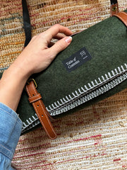 Wall blanket with leather strap