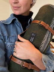 Wall blanket with leather strap